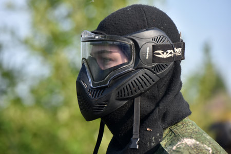 St. Petersburg, RUSSIA 19,08,2017 Open-air paintball tournament at the end of summer in nature, People in camouflage, with paintball guns and masksのeditorial素材