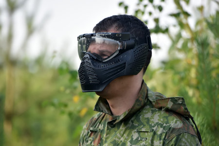 St. Petersburg, RUSSIA 19,08,2017 Open-air paintball tournament at the end of summer in nature, People in camouflage, with paintball guns and masksのeditorial素材