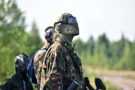 St. Petersburg, RUSSIA 19,08,2017 Open-air paintball tournament at the end of summer in nature, People in camouflage, with paintball guns and masksのeditorial素材