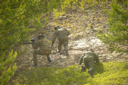 St. Petersburg, RUSSIA 27.06.2014 Open-air paintball tournament at the end of summer in nature,...