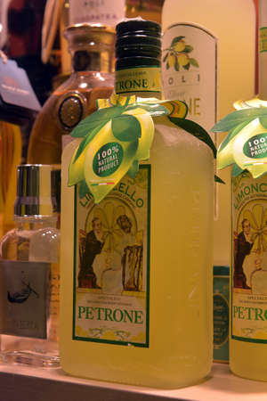 VENICE, ITALY 03,01,2018 : Traditional Italian liqueur Limoncello from different manufacturers in the shop window.のeditorial素材