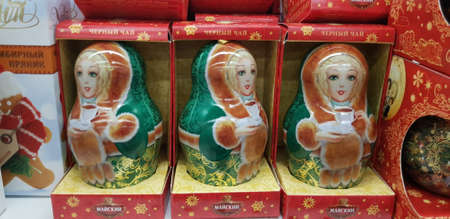 Russia, St. Petersburg 20,11,2018 Gift packs of tea in the form of nesting dolls in the storeのeditorial素材