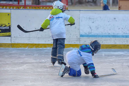 Russia, Severodvinsk 27,11,2016 Children with hockey sticks playing hockey at the festival "Hockey Day" outdoor street festivalのeditorial素材