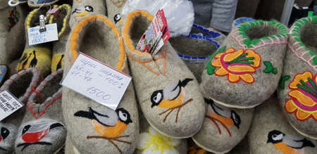 Russia, St. Petersburg 22,12,2018 Felt handmade home shoes at the Christmas fairのeditorial素材