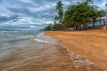 Thailand, Pattaya 08,08,2018 Deserted beach and stormy sky in the season of rainの写真素材