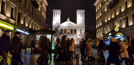 Russia, St. Petersburg 07,01,2019 Passers-by and tourists on the night Nevsky Prospect in winterのeditorial素材