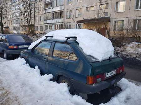 Russia, St. Petersburg 15,02,2019 Parked car covered with snowのeditorial素材