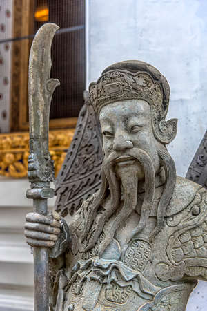 Thailand, Bangkok 08,08,2018 Close up the ancient Chinese warrior stone statues at wat Pho the temple in Bangkok,Thailand.のeditorial素材
