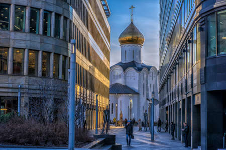 Russia, Moscow 06,04,2019 Church of St. Nicholas near the Belarusian station and modern office buildings in Moscow. Russiaのeditorial素材