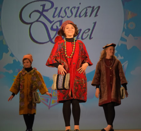 Russia, St. Petersburg 01,06,2019 Open Festival of Children's Fashion and Model Agencies. "Childhood is a bright planet" 2019. Children in Russian-style fashion dress, a demonstration of a coat and jacketsのeditorial素材