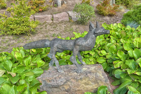 KOTKA, FINLAND 17,08,2019: Sculpture of fox on a rock in Sapokka Water Park in Kotka, Finland.のeditorial素材