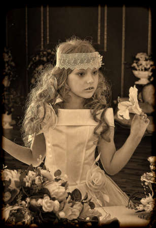 vintage cute girl in a white princess dressの写真素材