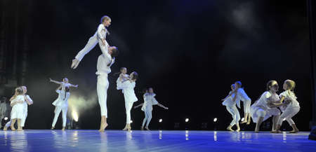 Russia, St. Petersburg 19,05,2019 Teenagers in white dancing on stage, Open Days of Russia festival.のeditorial素材