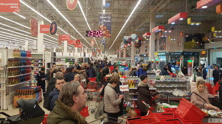 Russia, St. Petersburg 12,12,2019 A large queue of customers at the box office in the supermarketのeditorial素材