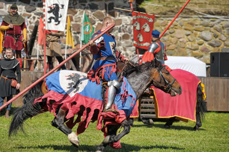 Russia, Priozersk 06.07.2014 A knight with a spear on a horse at the Russian Fortress festival of historical reconstructionのeditorial素材