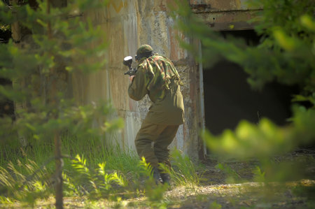 St. Petersburg, RUSSIA 20.06.2014 Open-air paintball tournament at the end of summer in nature,...