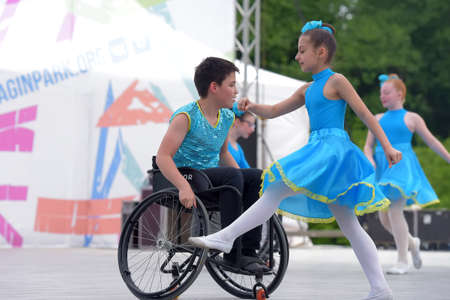 Russia, St. Petersburg 25,05,2019 Children in wheelchairs are dancing on the stage. The fulcrum festivalのeditorial素材