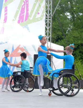 Russia, St. Petersburg 25,05,2019 Children in wheelchairs are dancing on the stage. The fulcrum festivalのeditorial素材
