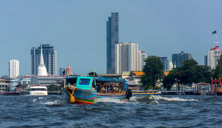 Thailand, Bangkok, 06.07,2019 Boat in chaopaya river.Passengers on the shuttle boatのeditorial素材