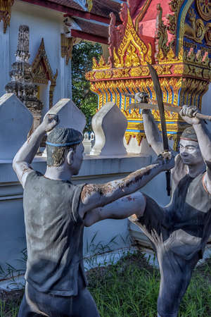 Thailand, Bang Khonthi District, 06.07,2019 Statues of fighters of the ancient Thai martial art Muay Boran in the temple of Bang Kung Campのeditorial素材