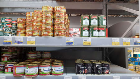Russia, St. Petersburg 24.03.2020 Shelves with canned goods in a supermarket during the coronavirus epidemicのeditorial素材