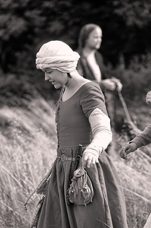 Russia, Vyborg, 30,07,2011 A woman in historical clothing at the Festival of the historical reconstruction of the Middle Ages "Vyborg Castle"のeditorial素材