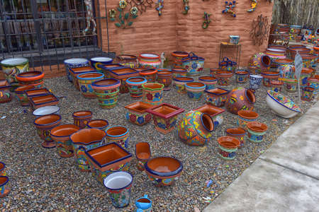 USA, Arizona, Tucson 26.06.2016 Hand made and painted colored pottery for sale at local street marketのeditorial素材