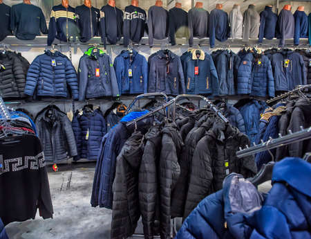Russia, St. Petersburg 12/16/2019 Men's autumn jackets in a clothing storeのeditorial素材