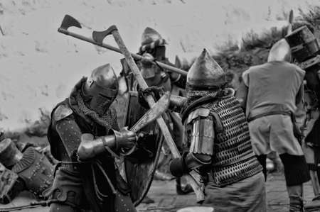 Russia, Vyborg. 13.07,2016 Festival of historical reconstruction. Knight's Castle. Knights in medieval armor during the battleのeditorial素材