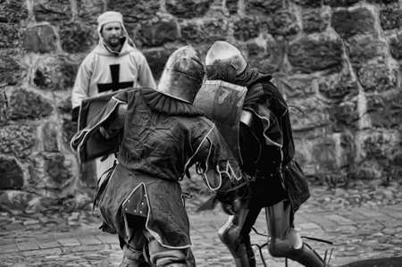Russia, Vyborg. 13.07,2016 Festival of historical reconstruction. Knight's Castle. Knights in medieval armor during the battleのeditorial素材