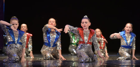 Russia, St. Petersburg 16.06.2019 Performance of a children's dance group in shiny costumes, in the...