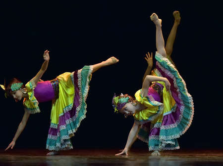 Russia, St. Petersburg 20,05,2019 Children in colorful costumes dance Mexican dance on stageのeditorial素材