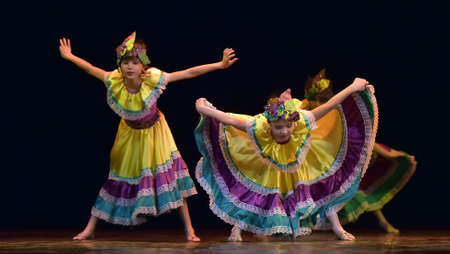 Russia, St. Petersburg 20,05,2019 Children in colorful costumes dance Mexican dance on stageのeditorial素材
