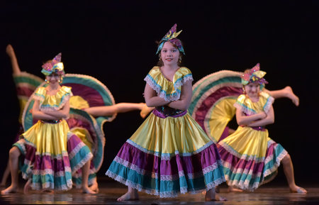 Russia, St. Petersburg 20,05,2019 Children in colorful costumes dance Mexican dance on stage