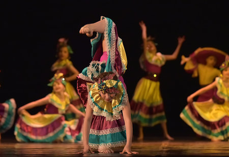 Russia, St. Petersburg 20,05,2019 Children in colorful costumes dance Mexican dance on stage