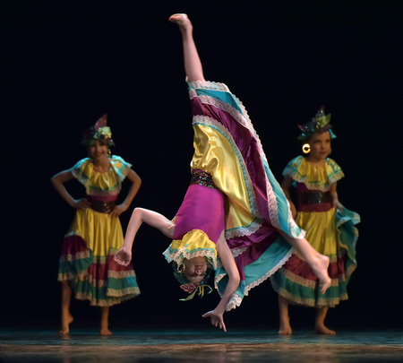Russia, St. Petersburg 20,05,2019 Children in colorful costumes dance Mexican dance on stage