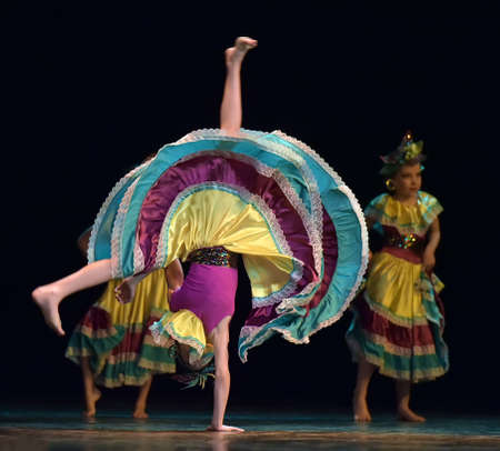 Russia, St. Petersburg 20,05,2019 Children in colorful costumes dance Mexican dance on stageのeditorial素材