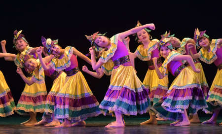 Russia, St. Petersburg 20,05,2019 Children in colorful costumes dance Mexican dance on stageのeditorial素材