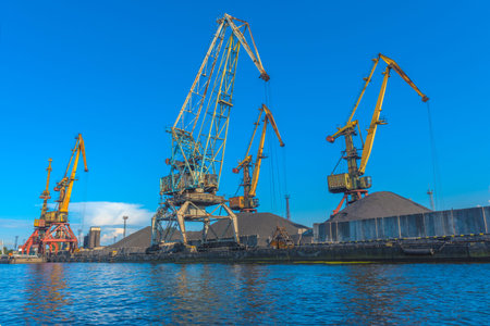 KALININGRAD, RUSSIA - 08/19/2020: Port cranes in summer day. Trade seaport