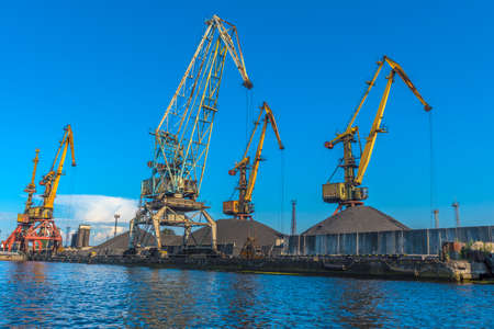 KALININGRAD, RUSSIA - 08/19/2020: Port cranes in summer day. Trade seaportのeditorial素材