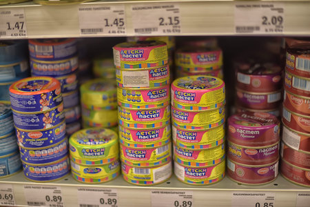 Russia, St. Petersburg 09,05,2020 Banks with pickles and canned goods on the supermarket shelf...