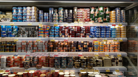 Russia, St. Petersburg 03.02.2021 Canned fish on a shelf in a supermarketのeditorial素材