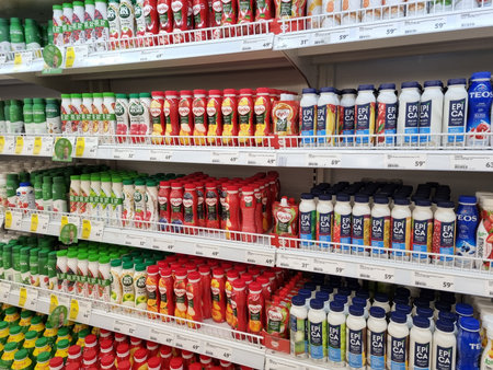 Russia, St. Petersburg 03/16/2021 Drinking yoghurts on sale on a supermarket shelf