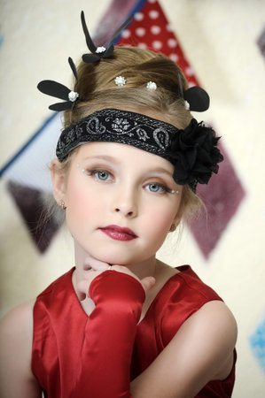 little girl in vintage style in red dress