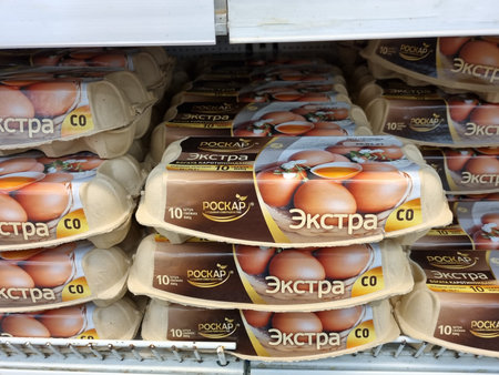Russia, St. Petersburg 01/04/2021 Packages of eggs for sale on supermarket shelvesのeditorial素材