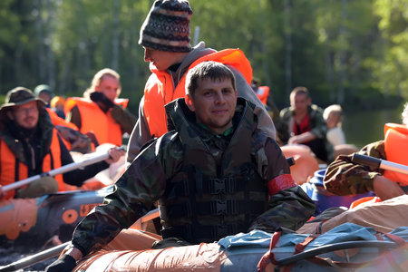 KARELIA REGION, RUSSIA - 18-07-2016: tourist rafting on an inflatable raft on the river from the rapids in Kareliaのeditorial素材