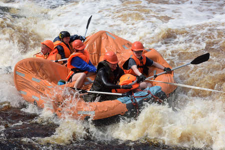 KARELIA REGION, RUSSIA - 18-07-2016: tourist rafting on an inflatable raft on the river from the rapids in Kareliaのeditorial素材