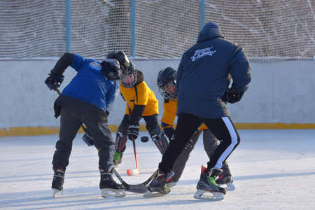 Russia, St. Petersburg 17.03.2019 12.02.2021 Playing ice hockey on an outdoor ice rinkのeditorial素材