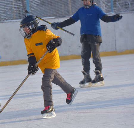 Russia, St. Petersburg 17.03.2019 12.02.2021 Playing ice hockey on an outdoor ice rinkのeditorial素材