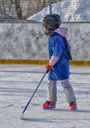 Russia, St. Petersburg 17.03.2019 12.02.2021 Playing ice hockey on an outdoor ice rink